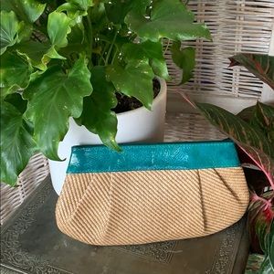 Woven clutch with teal patent leather